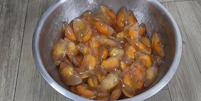 Finish and serve: Transfer the cooked dumplings to a bowl of cold water to cool and prevent sticking. Drain well and toss with scallion oil. Prepare the fish sauce dipping sauce by mixing sugar, fish sauce, lime juice, and water.