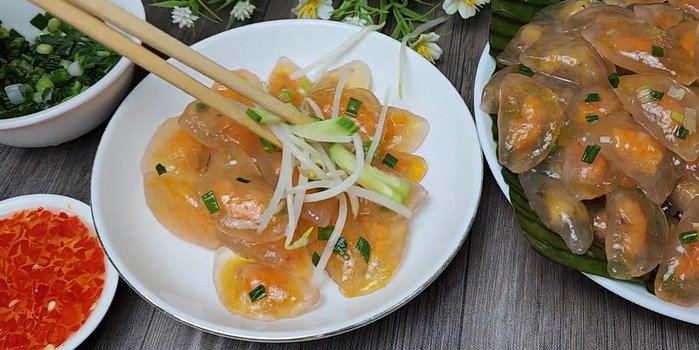 Serve Banh Bot Loc hot with the fish sauce, chili (optional), cucumber and bean sprouts (optional).