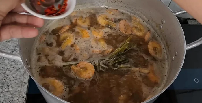 Add chopped chili peppers for spiciness.
