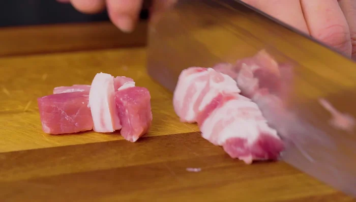Cut pork belly into small pieces.