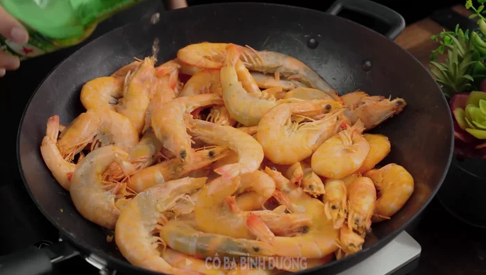 Add beer and continue steaming until shrimp turns red and even. Cover and steam for 2 more minutes.