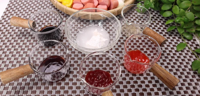 Prepare the sauce: Mix tapioca starch, water, ground pepper, tomato sauce, and soy sauce in a bowl.