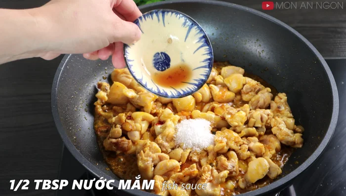 Add the spices: Add sugar, MSG, fish sauce, chili sauce, and soy sauce to the chicken. Stir well and cook until the sauce thickens. (244.819, 300.3)