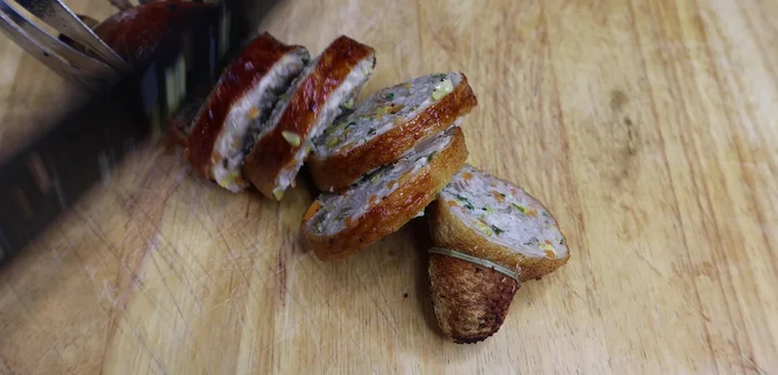 Cut the fried duck necks into bite-sized pieces.