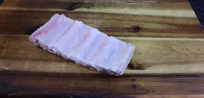 Pat the ribs dry with paper towels.