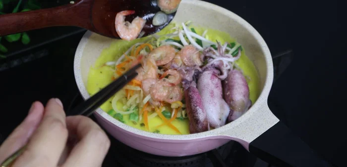 Cover the pan and cook for about 2 minutes, then remove the lid and cook until golden brown.