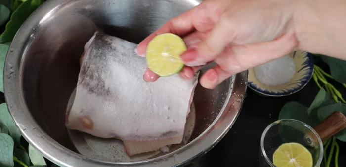 Season the fish with salt and lemon juice to remove the fishy smell.