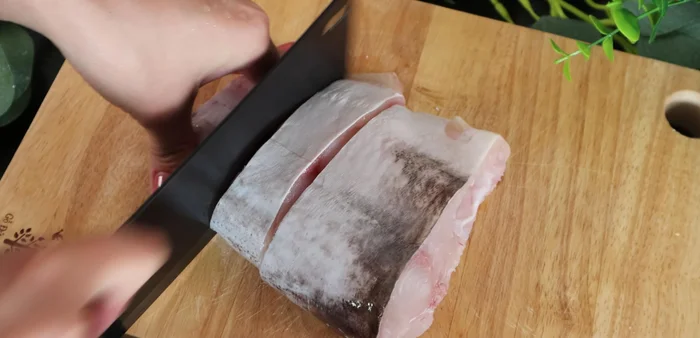 Cut the fish into pieces.