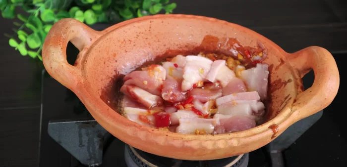 Add the pork belly and stir-fry for 5 minutes until slightly firm and golden. Remove the pork.