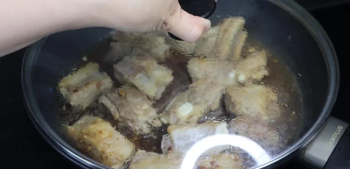 Simmer for about 20-30 minutes, or until the ribs are tender and the sauce has thickened.
