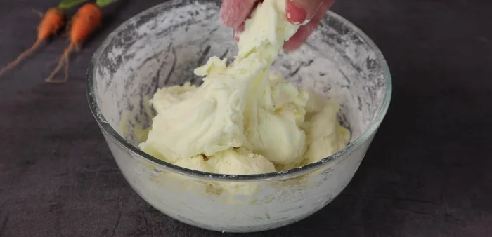 Knead the dough until dry and soft. Roll into small balls using a bottle to create a uniform shape.