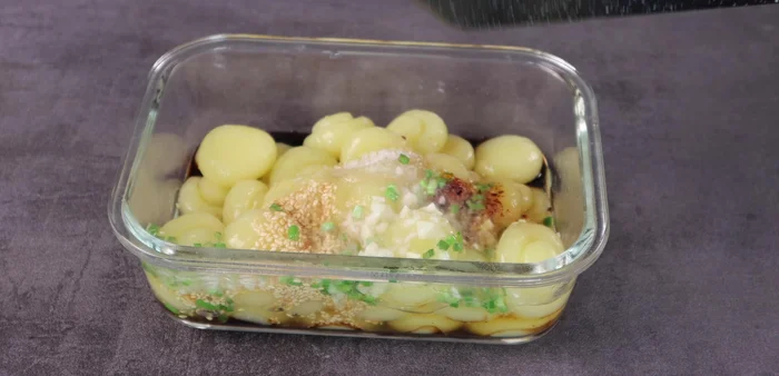 Add the drained potato balls to the sauce and mix well.