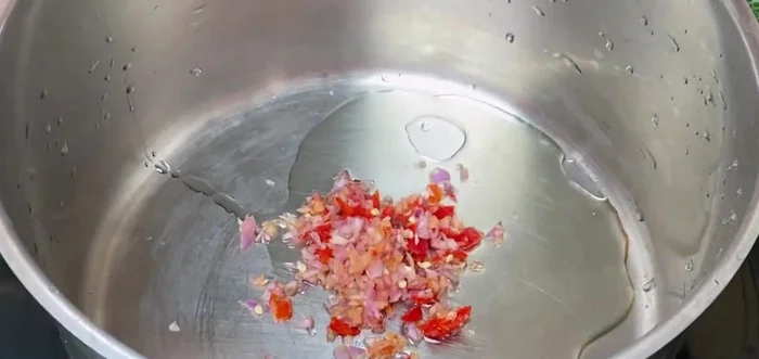 Stir-fry onions until fragrant and golden.