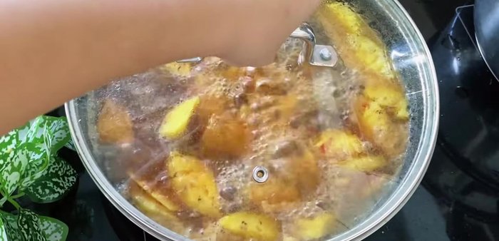 Add coconut water (or filtered water). Bring to a boil, then cover and simmer over low heat.