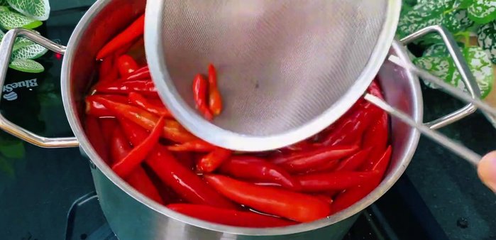 Rinse chili peppers with cold water to stop the cooking process and prevent overcooking (104.96)