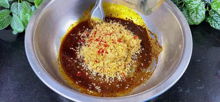 Add the blended ingredients and the chopped ribs to the marinade. Mix well and massage the ribs to ensure even coating.