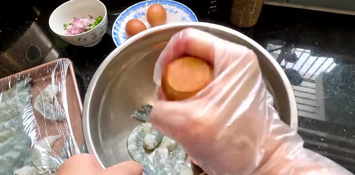 Take out the frozen shrimp and grind it in batches. Add remaining spices, shallots, green onions, and pepper.
