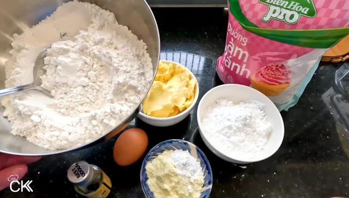 Beat margarine and powdered sugar together until dissolved. A mixer can be used, or a spatula.