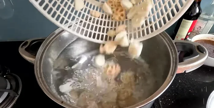 Add water to the pot, then add lotus root and water chestnuts. Cook for about 30 minutes, partially covered for softer texture, or uncovered for crispier texture (223.599).