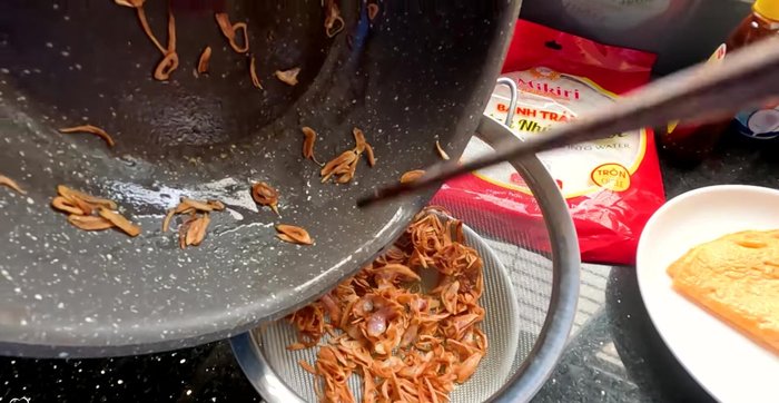 Roast peanuts until crushed.