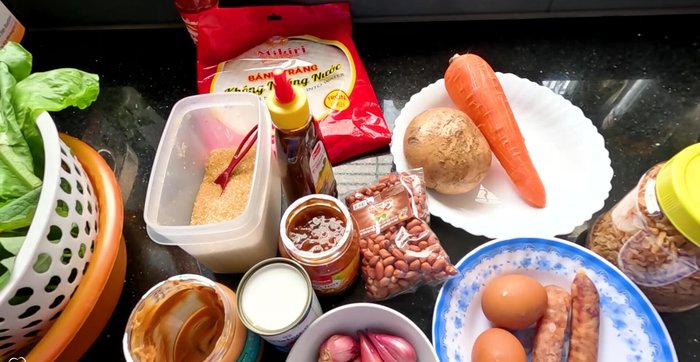 Prepare the dipping sauce ingredients: shallots, peanuts, coconut milk, soy sauce, peanut butter, black bean sauce, sugar, and bean sauce.