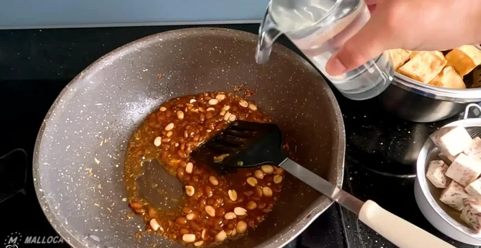 Add coconut water, sugar, and soy sauce (adjust to taste).