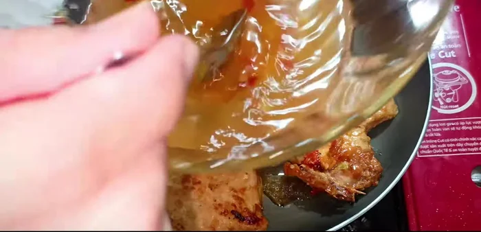 Bring the mixture to a boil, then skim off the foam. Braise the ribs, turning occasionally, until the liquid reduces.