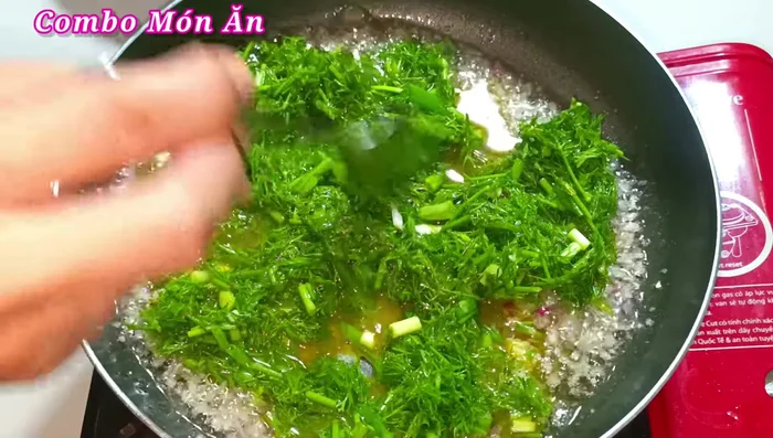 Pour the egg mixture into the pan and spread it evenly using a spoon.