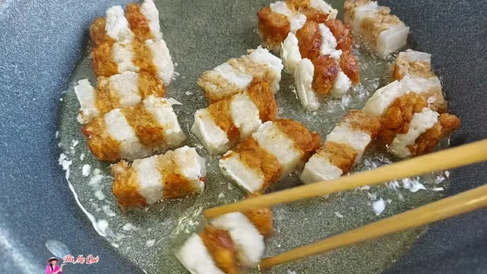 Cut the cooked vegan pork belly into pieces and optionally fry until golden brown.