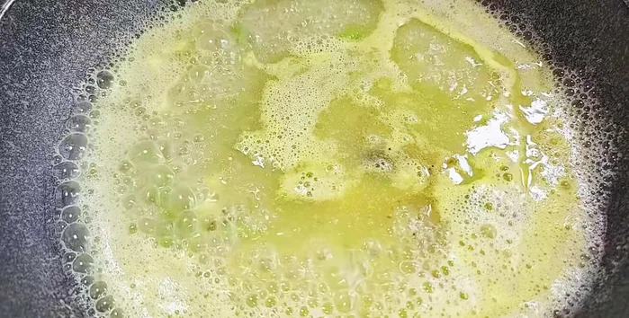 Season the sauce with chili sauce, sugar, vegetarian seasoning, and pepper to your taste.