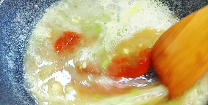 Cook the sauce until it thickens.
