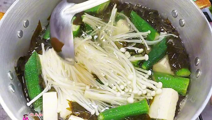 Turn off the stove. Add more vegetables (like basil and coriander) for fragrance.