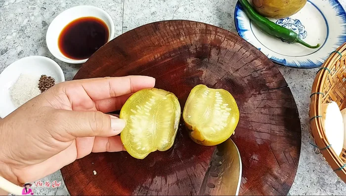 Cut the pickled watermelon and mushrooms into small pieces.