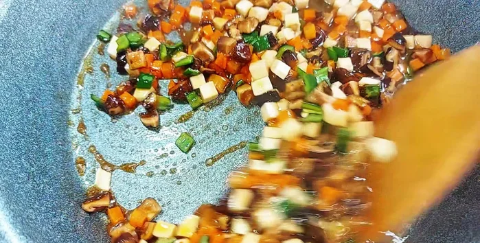 Add a little water and simmer until vegetables are cooked.