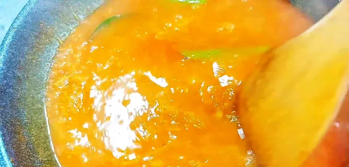 Blend the mixture again until smooth. Filter the mixture through a sieve, discarding the solids and keeping only the clear liquid.