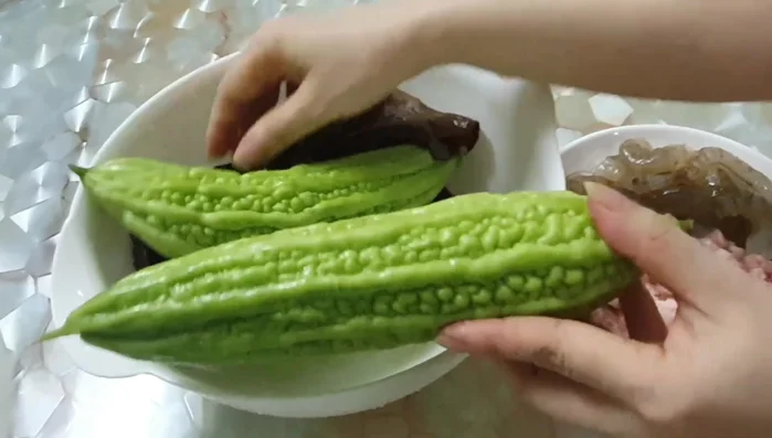 Season: Add fish sauce, salt, and sugar to taste. (This step is inferred; no exact time is given in the transcript)