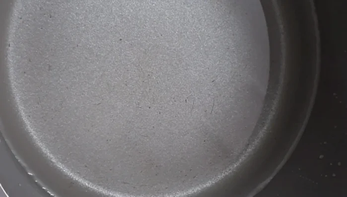 Boil about 2 liters of water in a pot.