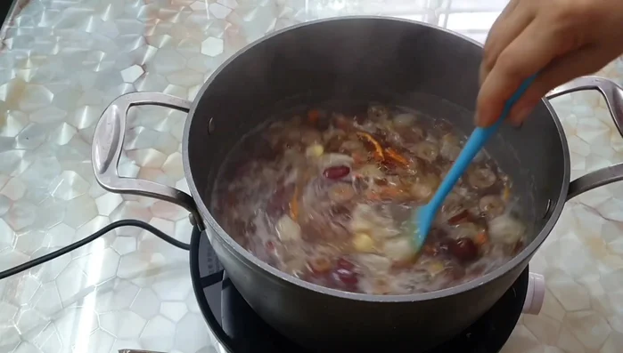 Add rock sugar and stir until dissolved.