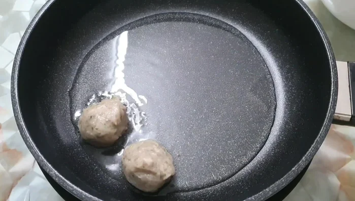 Roll the mixture into small, round balls.