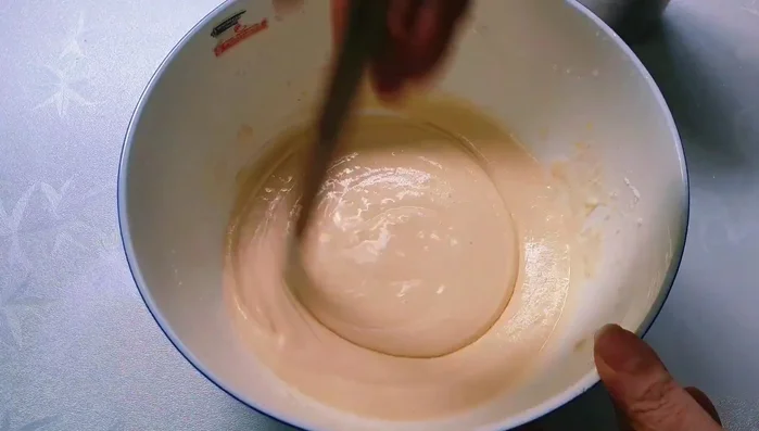 Add the egg mixture to the flour and mix well.