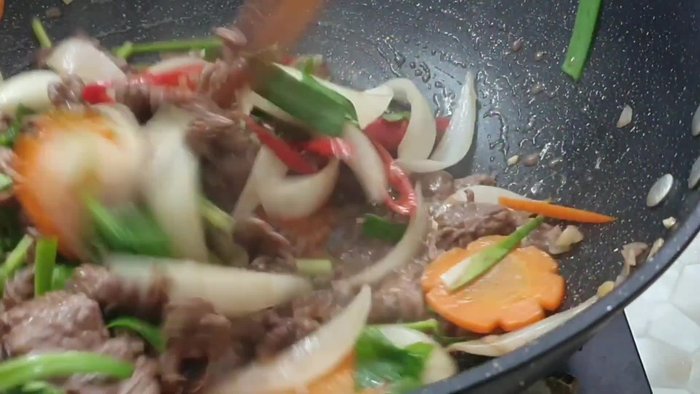 Prepare the vegetables: Chop your desired vegetables. (No specific instructions in transcript)