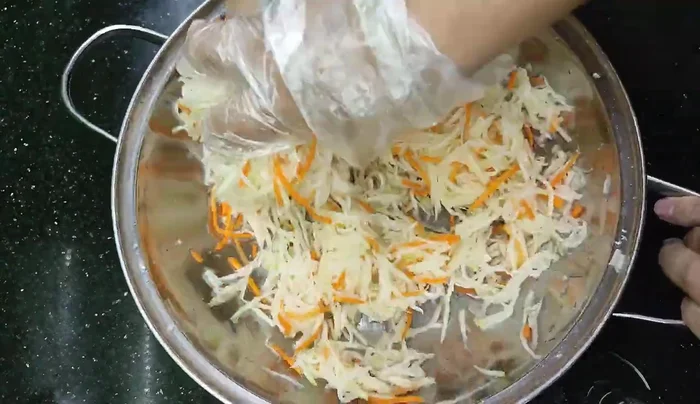 Season with salt, a generous amount of sugar, lemon or kumquat juice, and vinegar to taste.