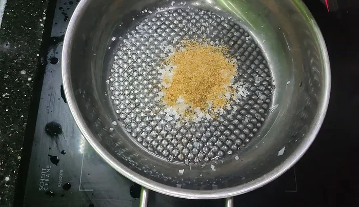 Prepare the brine: Boil water and reduce. Add vinegar, chili, and sugar to create a strong, slightly sweet brine to prevent spoilage and bitterness.
