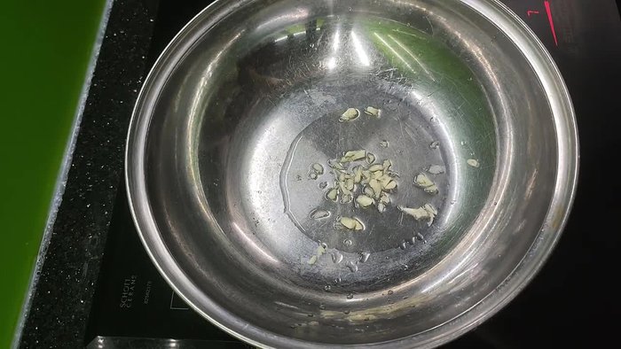 Add spices and herbs (garlic and onion, minced). Sauté until fragrant to reduce the smell of the meat.