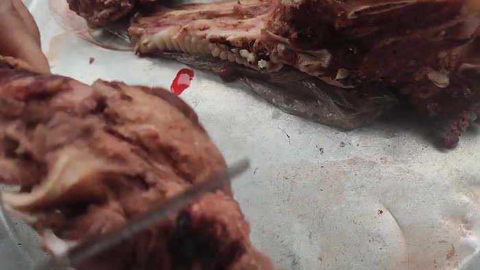 Boil the pig cheeks to remove any dirty blood.