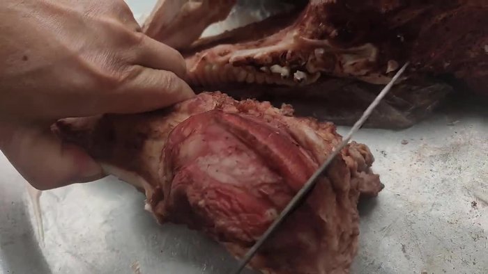 Cut away any thick parts of the pig cheek to make them easier to marinate and grill.
