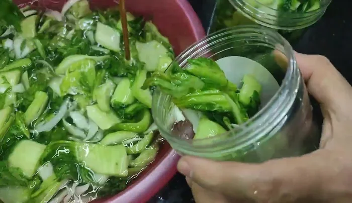 Repeat step 5, letting the cabbage sit for another half-day in the new brine.
