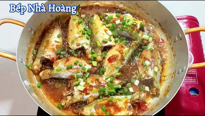 Add chopped green onions and simmer on low heat for another 40 seconds.