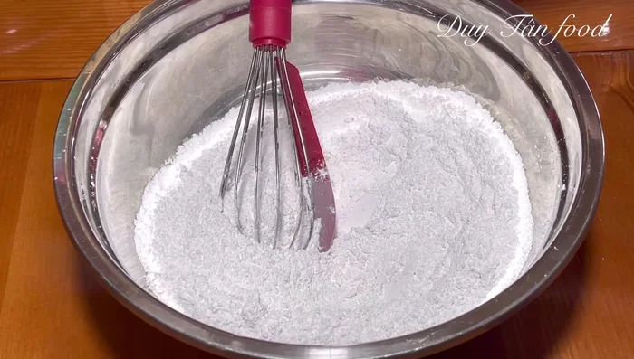 Prepare dough: Mix together glutinous rice flour, rice flour, wheat flour, 2 tablespoons of sugar, and ½ teaspoon of salt. (74.4)