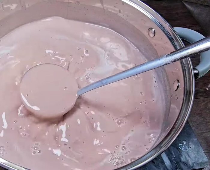 Cook the mixture over medium heat, stirring frequently to prevent sticking to the bottom of the pot.